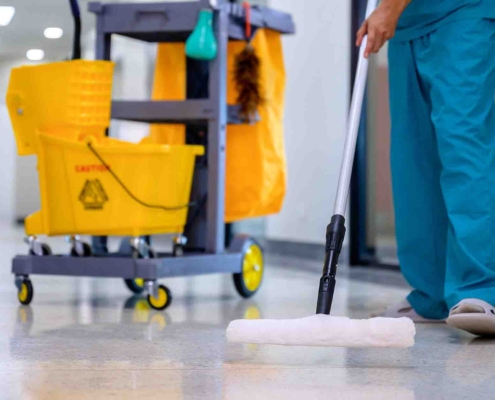 Janitor Sweeping Floor